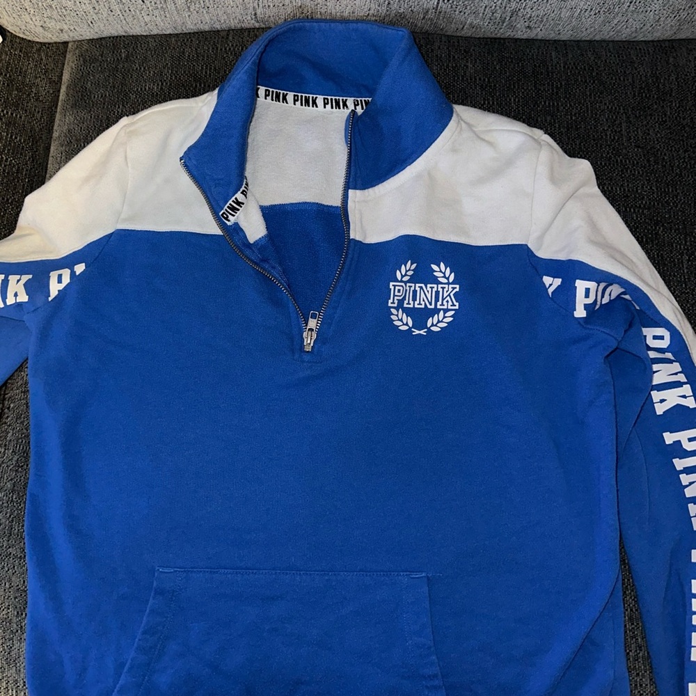 PINK Pullover, in great quality. There are no stains, and fits comfortably.